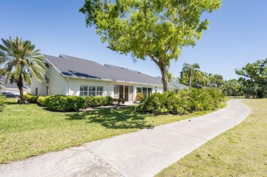 This centrally located 3 bedroom, 2 bath villa on Palm Aire Golf on University Park Country Club in Florida - for sale on GolfHomes.com, golf home, golf lot