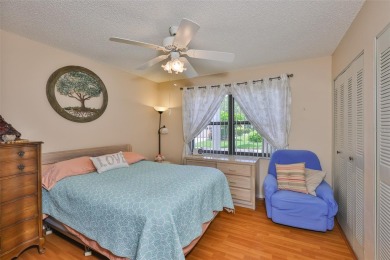 PANORAMIC GREENBELT with a WATER VIEW is TURNKEY! This SUPER on Falcon Watch Golf Club in Florida - for sale on GolfHomes.com, golf home, golf lot