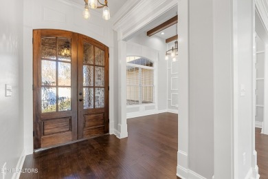 Welcome to your dream home, where Southern charm meets modern on Toqua Golf Course - Loudon County in Tennessee - for sale on GolfHomes.com, golf home, golf lot