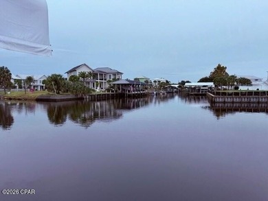 Imagine owning a rare canal front corner lot in picturesque on  in Florida - for sale on GolfHomes.com, golf home, golf lot