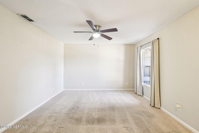 Welcome to this well maintained three bedroom, two bath townhome on Golf Club At Fleming Island in Florida - for sale on GolfHomes.com, golf home, golf lot