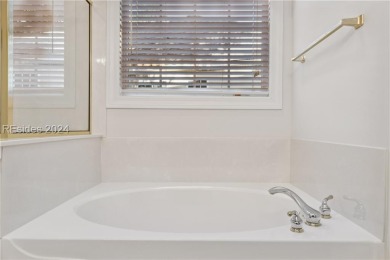 Charming 3 BD single-family home is located on a quiet on Belfair Golf Club in South Carolina - for sale on GolfHomes.com, golf home, golf lot