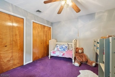 Welcome to 4 Lenape Trail, a spacious and inviting home located on Packanack Golf Club in New Jersey - for sale on GolfHomes.com, golf home, golf lot