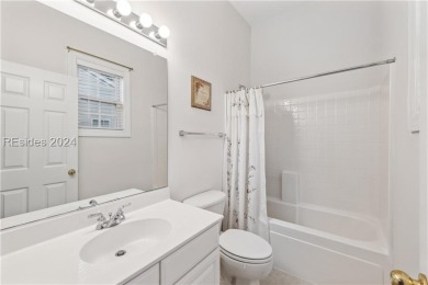 Charming 3 BD single-family home is located on a quiet on Belfair Golf Club in South Carolina - for sale on GolfHomes.com, golf home, golf lot