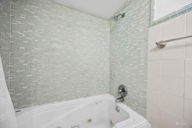 Welcome to this freshly renovated 2 bedroom, 1 full and 2 half on Village Greens of Woodridge Golf Course in Illinois - for sale on GolfHomes.com, golf home, golf lot
