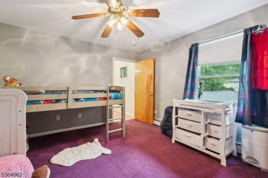 Welcome to 4 Lenape Trail, a spacious and inviting home located on Packanack Golf Club in New Jersey - for sale on GolfHomes.com, golf home, golf lot