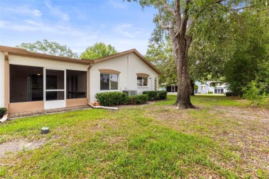 Nestled in the heart of a charming golf course community, this on Heather Golf and Country Club in Florida - for sale on GolfHomes.com, golf home, golf lot