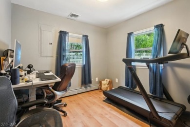 Welcome to 4 Lenape Trail, a spacious and inviting home located on Packanack Golf Club in New Jersey - for sale on GolfHomes.com, golf home, golf lot