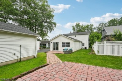 Welcome to 4 Lenape Trail, a spacious and inviting home located on Packanack Golf Club in New Jersey - for sale on GolfHomes.com, golf home, golf lot