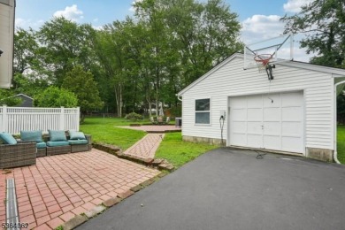 Welcome to 4 Lenape Trail, a spacious and inviting home located on Packanack Golf Club in New Jersey - for sale on GolfHomes.com, golf home, golf lot