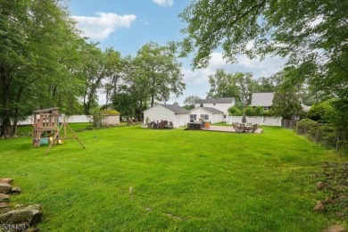 Welcome to 4 Lenape Trail, a spacious and inviting home located on Packanack Golf Club in New Jersey - for sale on GolfHomes.com, golf home, golf lot
