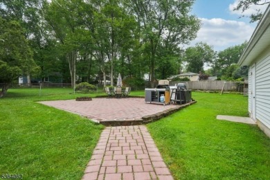 Welcome to 4 Lenape Trail, a spacious and inviting home located on Packanack Golf Club in New Jersey - for sale on GolfHomes.com, golf home, golf lot