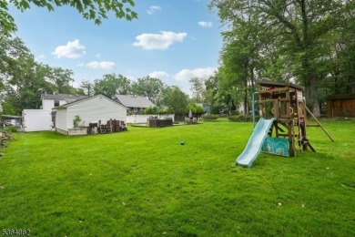 Welcome to 4 Lenape Trail, a spacious and inviting home located on Packanack Golf Club in New Jersey - for sale on GolfHomes.com, golf home, golf lot