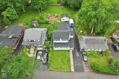 Welcome to 4 Lenape Trail, a spacious and inviting home located on Packanack Golf Club in New Jersey - for sale on GolfHomes.com, golf home, golf lot