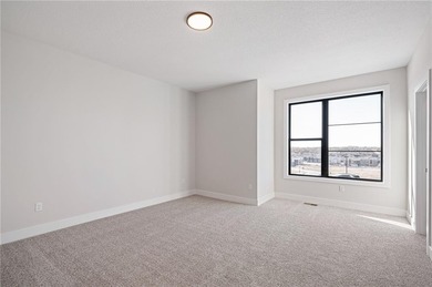 Discover modern, low-maintenance luxury living in this stunning on The Golf Club of Kansas in Kansas - for sale on GolfHomes.com, golf home, golf lot