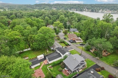 Welcome to 4 Lenape Trail, a spacious and inviting home located on Packanack Golf Club in New Jersey - for sale on GolfHomes.com, golf home, golf lot