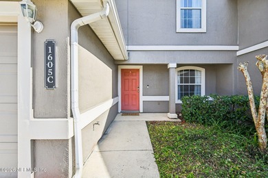 Welcome to this well maintained three bedroom, two bath townhome on Golf Club At Fleming Island in Florida - for sale on GolfHomes.com, golf home, golf lot
