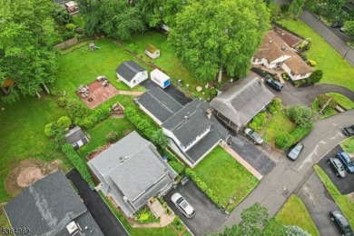 Welcome to 4 Lenape Trail, a spacious and inviting home located on Packanack Golf Club in New Jersey - for sale on GolfHomes.com, golf home, golf lot