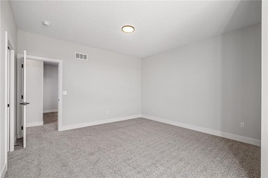 Discover modern, low-maintenance luxury living in this stunning on The Golf Club of Kansas in Kansas - for sale on GolfHomes.com, golf home, golf lot