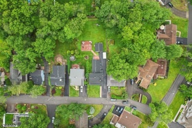 Welcome to 4 Lenape Trail, a spacious and inviting home located on Packanack Golf Club in New Jersey - for sale on GolfHomes.com, golf home, golf lot