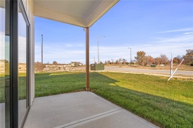 Discover modern, low-maintenance luxury living in this stunning on The Golf Club of Kansas in Kansas - for sale on GolfHomes.com, golf home, golf lot