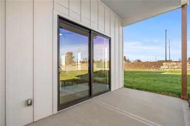 Discover modern, low-maintenance luxury living in this stunning on The Golf Club of Kansas in Kansas - for sale on GolfHomes.com, golf home, golf lot