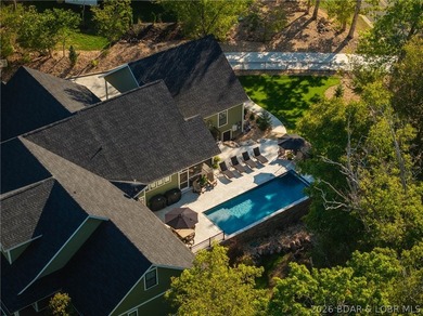 Resort-style luxury in coveted Osage National! This fully on Osage National Golf Club in Missouri - for sale on GolfHomes.com, golf home, golf lot