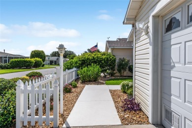 This 2/2 Cabot Cove Patio Villa is situated in the Village of on Truman Executive Golf Course in Florida - for sale on GolfHomes.com, golf home, golf lot