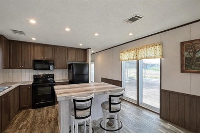 Your Lake Fork fishing retreat awaits in the gated community of on Links At Lands End in Texas - for sale on GolfHomes.com, golf home, golf lot