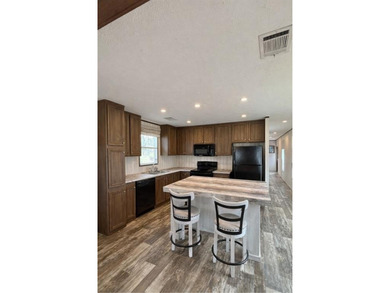 Your Lake Fork fishing retreat awaits in the gated community of on Links At Lands End in Texas - for sale on GolfHomes.com, golf home, golf lot