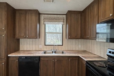 Your Lake Fork fishing retreat awaits in the gated community of on Links At Lands End in Texas - for sale on GolfHomes.com, golf home, golf lot