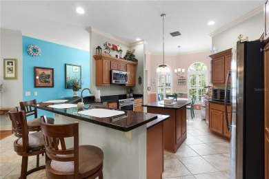 This stunning 3/2 MAGNOLIA single-family home is situated in the on Amberwood Executive Golf Course in Florida - for sale on GolfHomes.com, golf home, golf lot