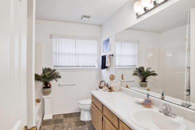Nestled among gorgeous mature trees, this spacious 2,200 sq ft on The Golf Club of the Wharf in Alabama - for sale on GolfHomes.com, golf home, golf lot