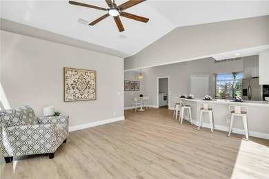 Step into this beautifully updated 3-bedroom, 2-bathroom home on Pinemoor West Golf Club in Florida - for sale on GolfHomes.com, golf home, golf lot