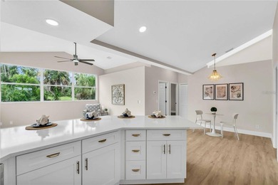 Step into this beautifully updated 3-bedroom, 2-bathroom home on Pinemoor West Golf Club in Florida - for sale on GolfHomes.com, golf home, golf lot