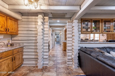 Pinetop Country Club stunning log cabin designed for comfort on Pinetop Lakes Country Club in Arizona - for sale on GolfHomes.com, golf home, golf lot