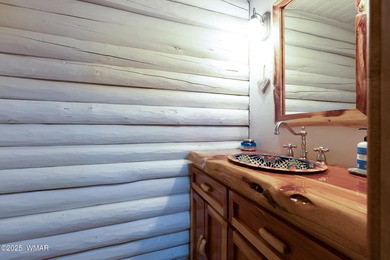 Pinetop Country Club stunning log cabin designed for comfort on Pinetop Lakes Country Club in Arizona - for sale on GolfHomes.com, golf home, golf lot