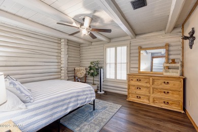 Pinetop Country Club stunning log cabin designed for comfort on Pinetop Lakes Country Club in Arizona - for sale on GolfHomes.com, golf home, golf lot