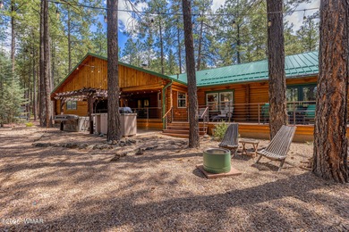 Pinetop Country Club stunning log cabin designed for comfort on Pinetop Lakes Country Club in Arizona - for sale on GolfHomes.com, golf home, golf lot