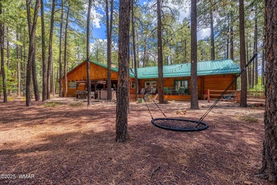 Pinetop Country Club stunning log cabin designed for comfort on Pinetop Lakes Country Club in Arizona - for sale on GolfHomes.com, golf home, golf lot
