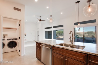 Experience the best of Saddlebrooke living in this beautifully on Saddlebrooke Golf Course in Arizona - for sale on GolfHomes.com, golf home, golf lot