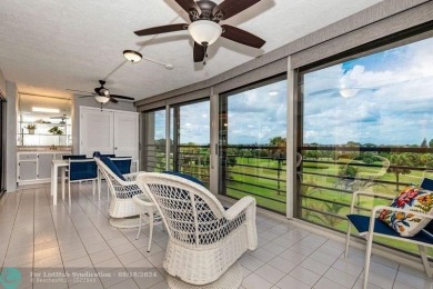 SPECTACULAR PANORAMIC VIEWS OF THE GOLF COURSE FROM THE LARGE on Boca Dunes Golf and Country Club in Florida - for sale on GolfHomes.com, golf home, golf lot