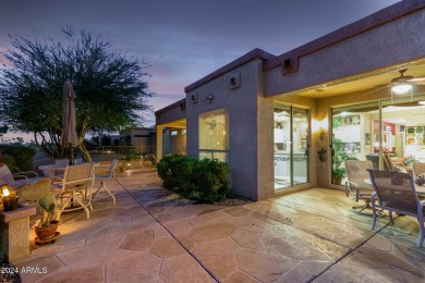 Experience resort-style living with this elegant home offering on Sun City Grand Golf Couse and Club in Arizona - for sale on GolfHomes.com, golf home, golf lot