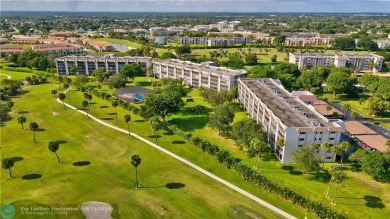 SPECTACULAR PANORAMIC VIEWS OF THE GOLF COURSE FROM THE LARGE on Boca Dunes Golf and Country Club in Florida - for sale on GolfHomes.com, golf home, golf lot