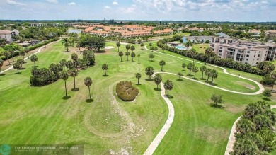 SPECTACULAR PANORAMIC VIEWS OF THE GOLF COURSE FROM THE LARGE on Boca Dunes Golf and Country Club in Florida - for sale on GolfHomes.com, golf home, golf lot