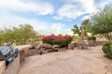 Experience resort-style living with this elegant home offering on Sun City Grand Golf Couse and Club in Arizona - for sale on GolfHomes.com, golf home, golf lot