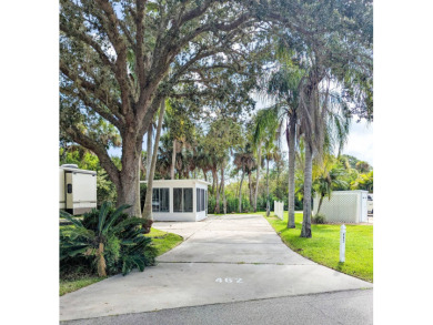 This RV site features an 11'x15' Fflorida Room with a 79' long on The Great Outdoors Golf and Country Club in Florida - for sale on GolfHomes.com, golf home, golf lot