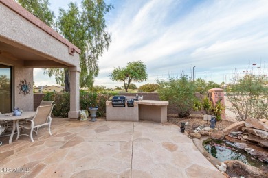 Experience resort-style living with this elegant home offering on Sun City Grand Golf Couse and Club in Arizona - for sale on GolfHomes.com, golf home, golf lot