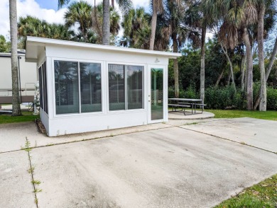 This RV site features an 11'x15' Fflorida Room with a 79' long on The Great Outdoors Golf and Country Club in Florida - for sale on GolfHomes.com, golf home, golf lot