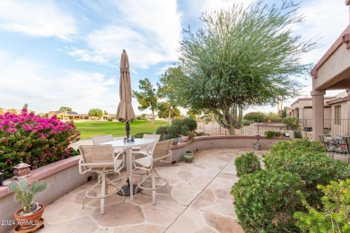 Experience resort-style living with this elegant home offering on Sun City Grand Golf Couse and Club in Arizona - for sale on GolfHomes.com, golf home, golf lot